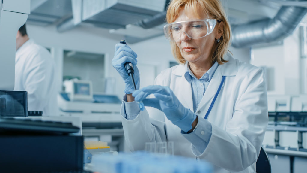 Scientist working in lab at a compounding pharmacy. 